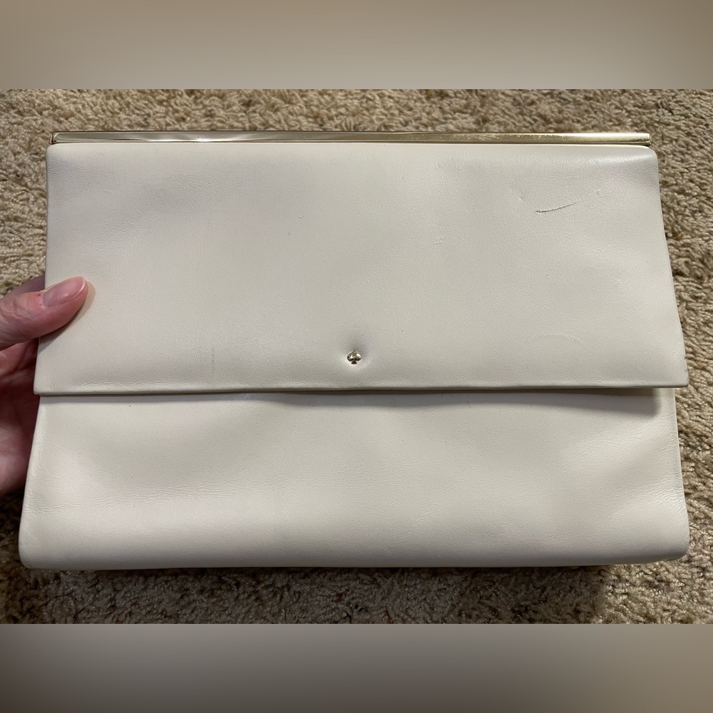 Kate Spade large cream handheld leather clutch with gold accents